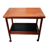A contemporary Danish teak tea trolley - rectangular fold over top on turned tapering legs joined by
