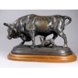 In the manner of Pierre-Jules Mene - standing bull and dog at its feet, width 31cm.