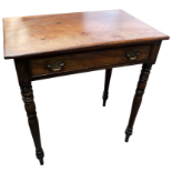 A 19th century mahogany side table - the rectangular top above a frieze drawer on turned tapering