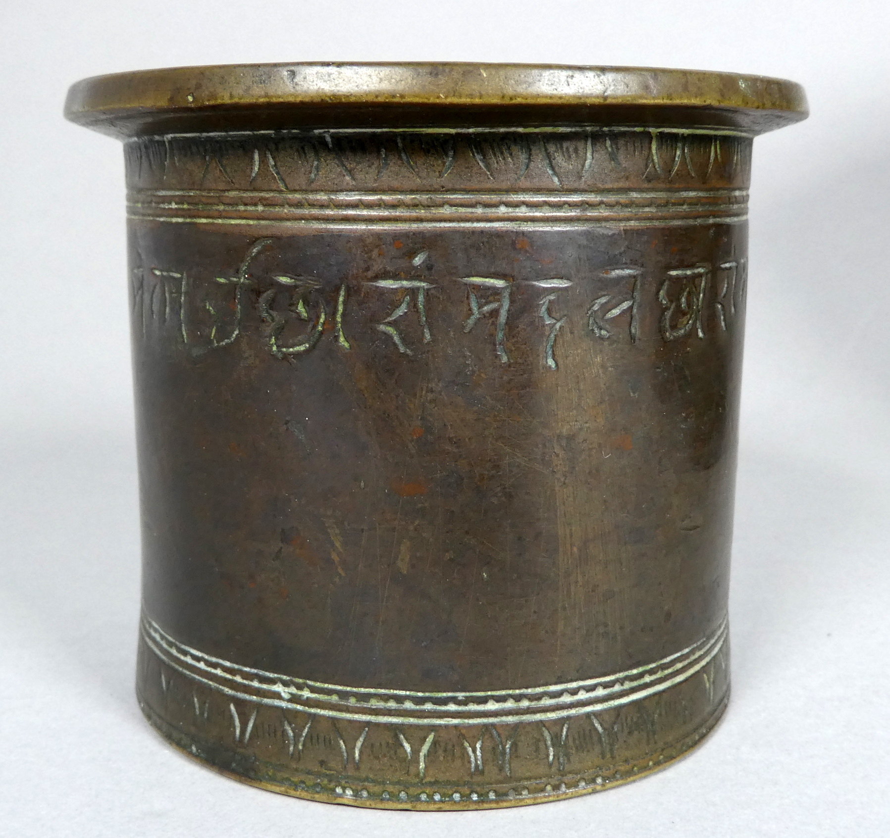 A 19th century bronze measure - engraved with palmettes, height 7cm, together with two treen jars - Image 3 of 6