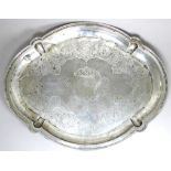 An early 20th century continental white metal oval tray - foliate strapwork decoration with a shaped