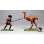 Three cast lead figures - Maori warrior, emu and kiwi.
