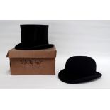 A silk top hat - with cardboard box, together with a bowler by Dunn & Co.