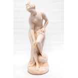 A plaster figure of Venus at her bath after Antonio Canova - on a socle base, height 58cm.