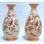 Crown Ducal - a pair of baluster shape vase, decoration with birds and foliage on a blush ground,