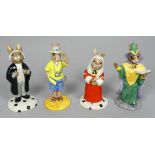 Royal Doulton Bunnykins figure of a barrister - height 12cm, together with three other characters.