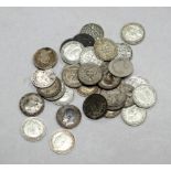 Thirty-five various three pence coins - some Victorian, mostly pre 1940.