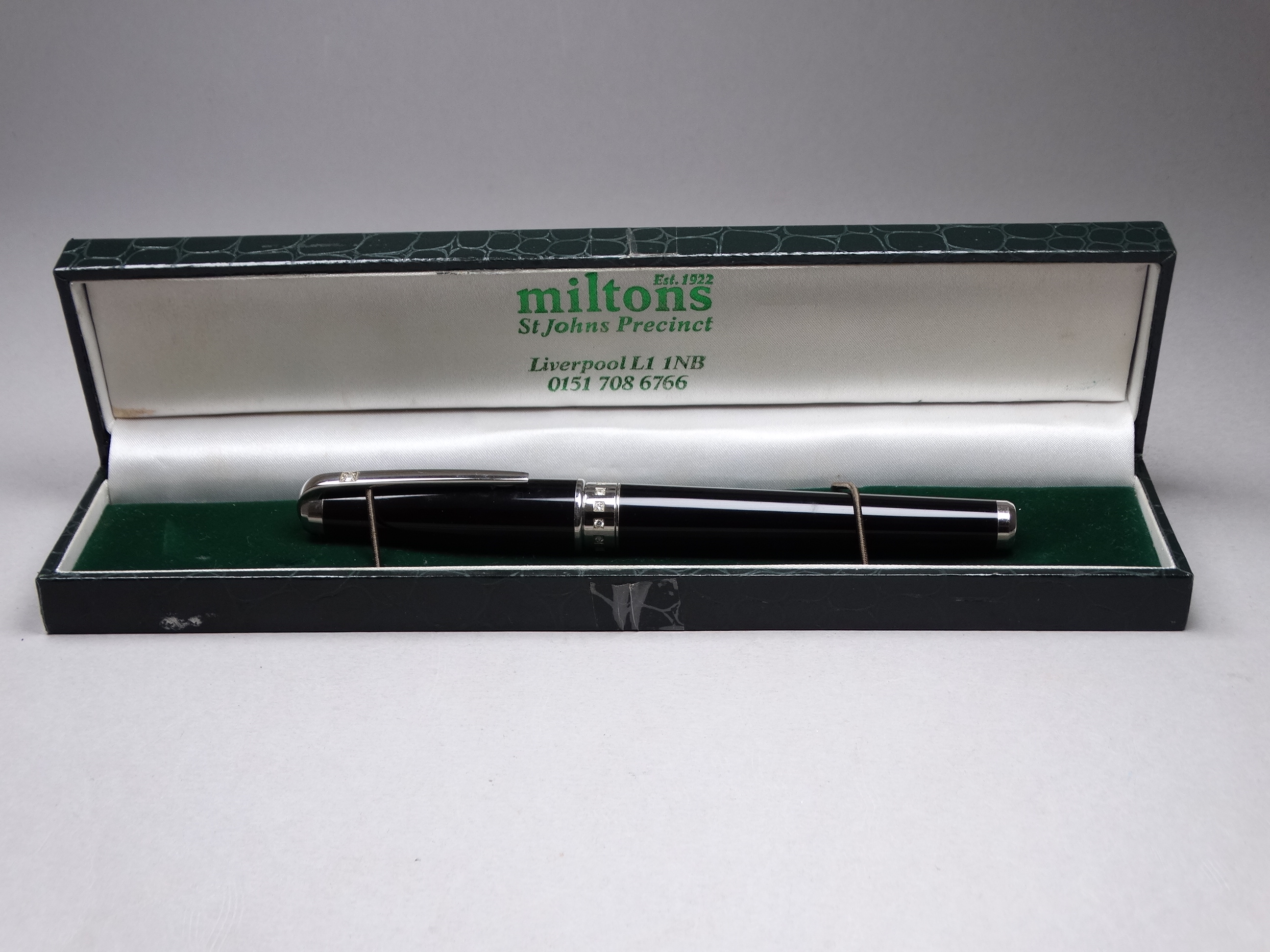 A Dupont ballpoint - black with a diamond set band, in an associated box. - Image 2 of 4