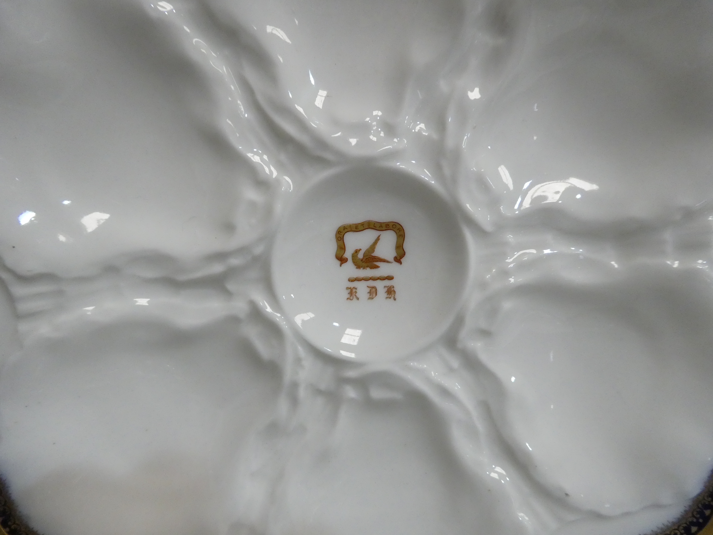 A set of six early 20th century French oyster plates - moulded with a gilt rim and ownership - Image 5 of 5