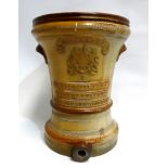 A Carbon Filter Co. water filter - salt glazed pottery with armorial and tap to base, height 36cm.