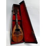 A late 19th century mandolin - Walter E. Vane and dated 4th October '99, length of back 29cm, in a