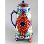 A Japanese Meiji period Imari water dispenser - of lidded tapering form with loop handle and