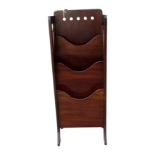 An Arts and Crafts inspired mahogany magazine rack - with an arrangement of three tiered