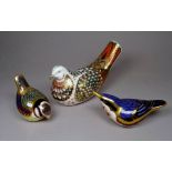 A Royal Crown Derby paperweight modelled in the form of a dove - length 15cm, together with two