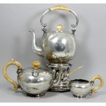 A late 19th century three piece continental white metal tea service - bearing purity and maker's