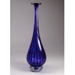 CHARLES Jane - a studio glass slender spiral fluted vase, with clear glass foot, signed to base,