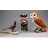 A Beswick Barn Owl - standing on a natural base, height 18cm, together with a Beswick pheasant and a