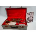 A mid 20th century brass trumpet - Corton, in fitted case.