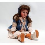 An early 20th century bisque head doll attributed to Heubach - with articulated eyes and open