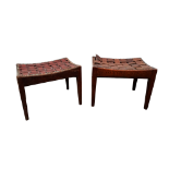 A pair of oak stools in the manner of Liberty - rectangular with a studded leather thong seat on