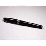 A Dupont ballpoint - black with a diamond set band, in an associated box.