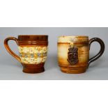 A Doulton Lambeth mug - salt glazed with applied and sgraffito foliate decoration, height 10cm,