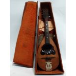 An early 20th century Italian mandolin - dated 1897 and retailed by Keith Prowse & Co. London,