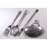 A silver purse - Birmingham 1915, W G Sothers & Co, of oval form and engraved with ribbons and
