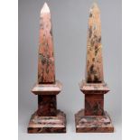 A 19th century pair of pink marble obelisks - raised on square stepped bases, height 30cm.