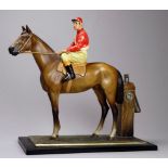 An early 20th century cold painted spelter table lighter - modelled in the form of a horse with