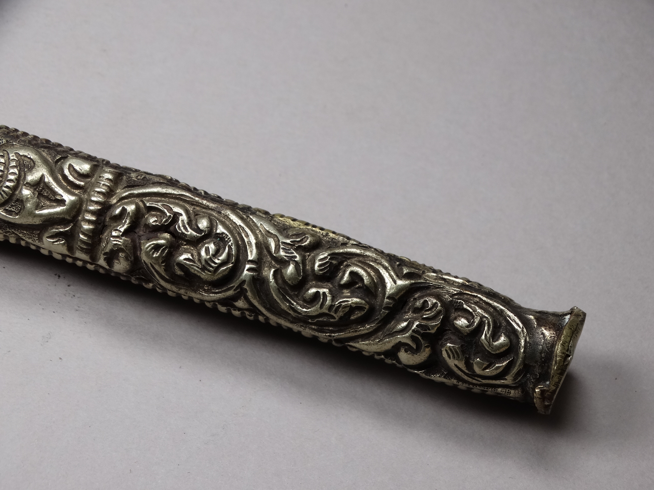 A white metal knife and chopsticks set - repousse decorated with dragons and flowers, length 30cm, - Image 8 of 21