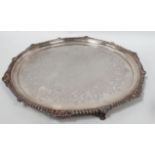 A large silver tray - Sheffield 1895, Atkin Brothers, circular with gadrooned and shell cast