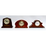An Art Deco style mahogany case mantel timepiece - movement by Seth Thomas, the silvered dial set