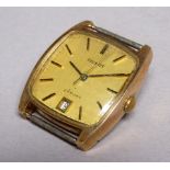 A 9ct yellow gold Tissot watch head - of rounded square form, the yellow dial with baton numerals