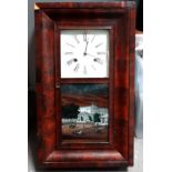 A late 19th century American wall clock - by E. N. Welch, with a rectangular mahogany case, the door