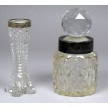 A cut glass dressing table bottle with silver rim - London 1894, William Hutton & Sons Ltd, height