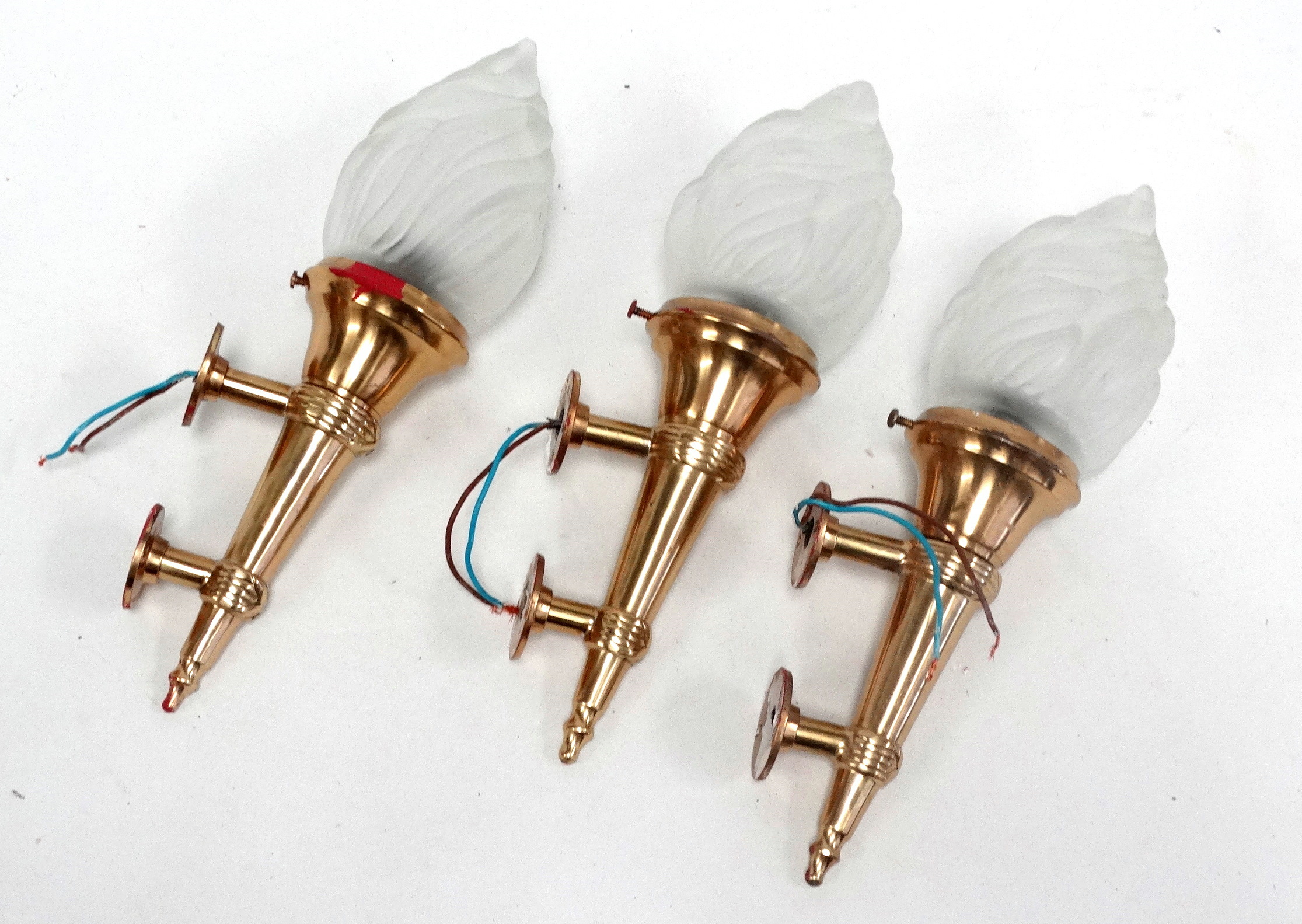 Three late 20th century brass torchere wall lights - with twin fixings and frosted clear glass