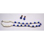 A lapis lazuli and seed pearl necklace - with an alternating arrangement of asymetrical pearls and