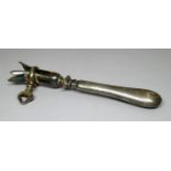 A French silver handled ham bone holder - with Minerva Grade I strike marks to handle, length 21cm.