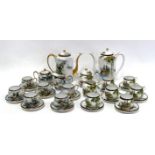 A 20th century Japanese dinner service by Soko - six place settings, comprising two tureens,