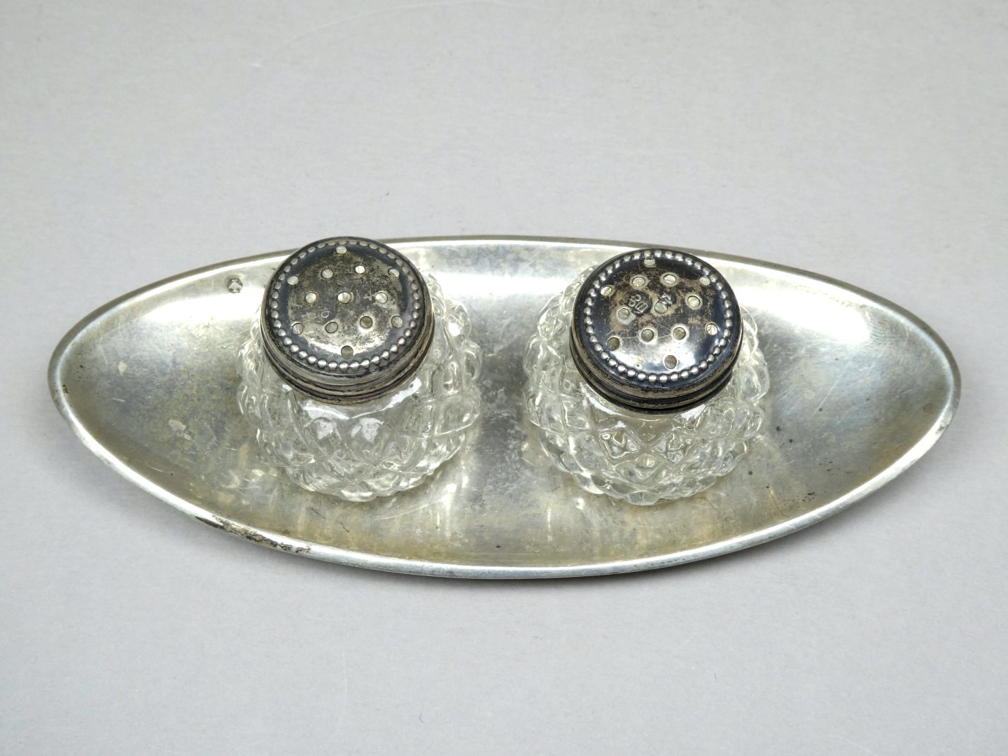 A white metal condiment tray - strike mark to rim, with two cut glass pots, width 12cm. - Image 7 of 12