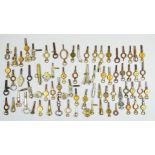 A collection of approximately seventy pocket watch keys - gilded, steel and white metal, some fitted