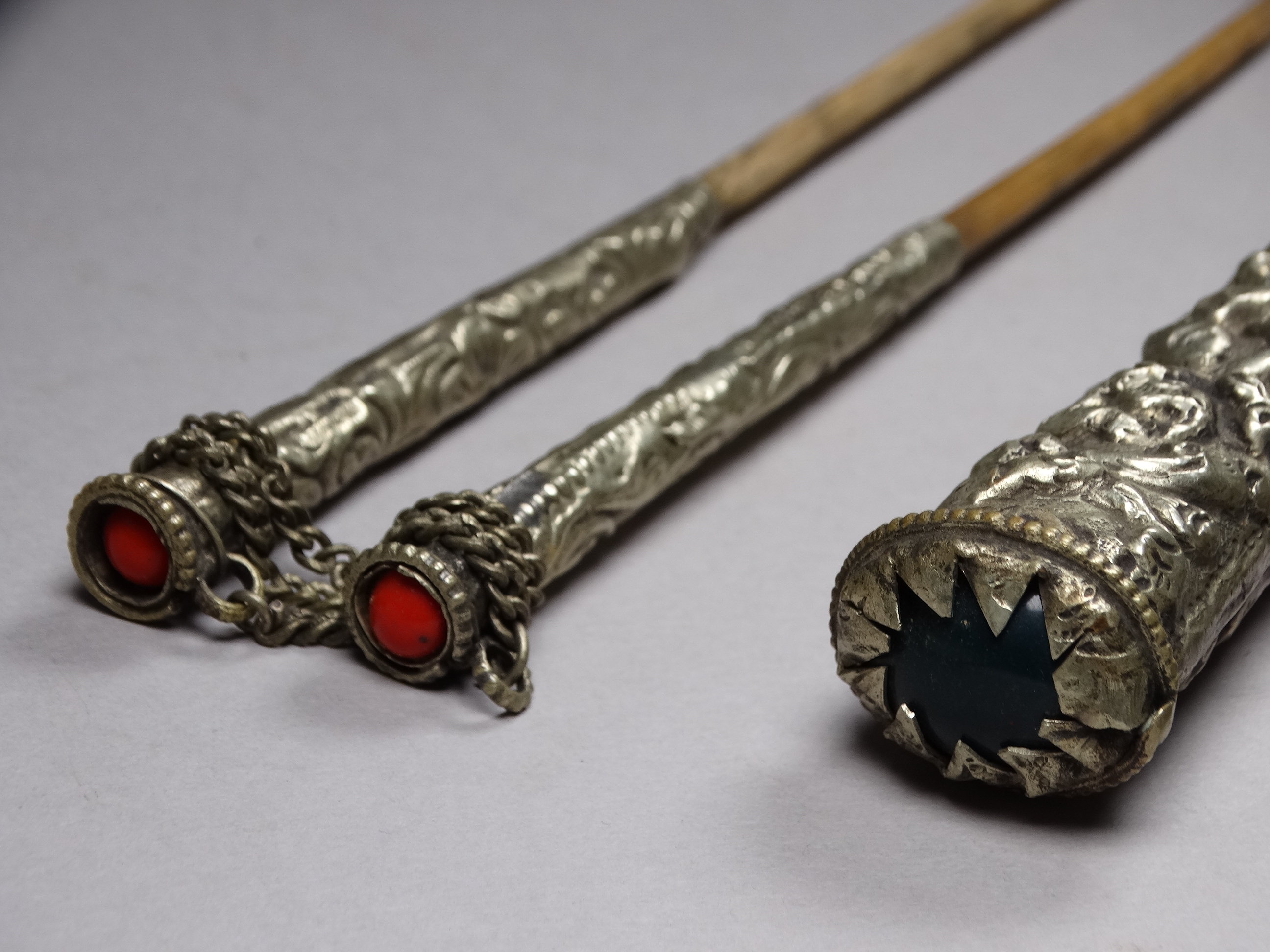 A white metal knife and chopsticks set - repousse decorated with dragons and flowers, length 30cm, - Image 21 of 21