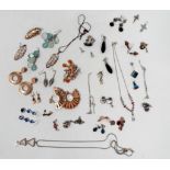 Approximately twenty-five costume jewellery earrings.