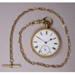 An 18ct yellow gold cased open face pocket watch - the white enamel dial set out in Roman numerals