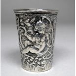 A small silver beaker - decorated with cherubs and with vacant cartouche, London 1896, Edwin