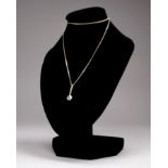 A 9ct yellow gold pendant necklace - set with a diamond, total weight 2.6g.