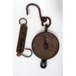 A set of early 20th century Salter iron and brass spring balance scales - the circular dial