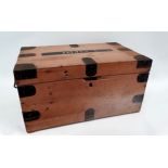 A 20th century pine and plywood footlocker - with steel binding and stencilled ownership details,