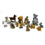 A collection of nineteen Wade figures - including Tom & Jerry, Disney characters and others (19).